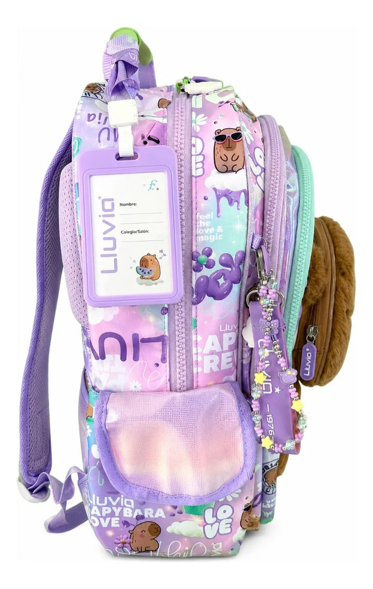 Mochila Escolar Lluvia Capibara Lila Con Bolsillos Laterales